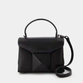 Valentino Garavani  One Stud Mini Top Handle Bag in Black Leather